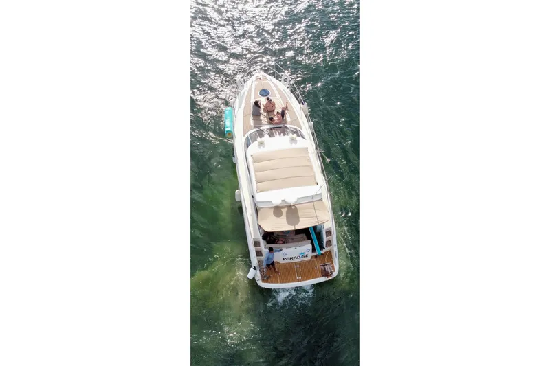  Yacht Photos Pics Aerial view of 2011 Azimut Atlantis 40 yacht cruising on clear water.