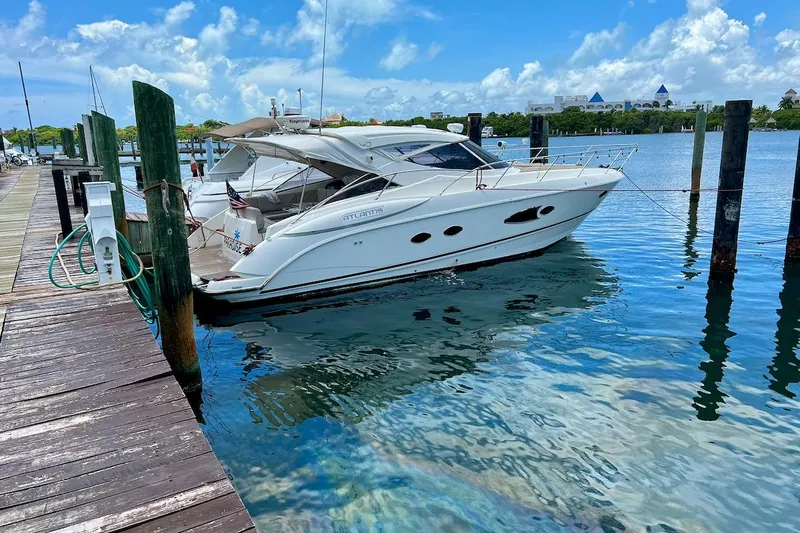  Yacht Photos Pics 2011 Azimut Atlantis 40 yacht docked at a marina under a clear blue sky.