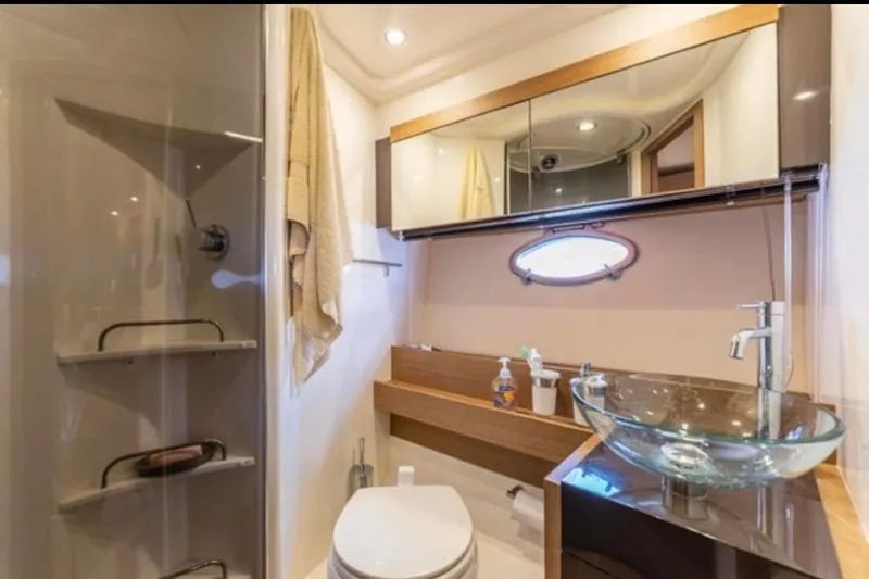  Yacht Photos Pics Luxurious bathroom in 2011 Azimut Atlantis 40 yacht with glass sink and shower.