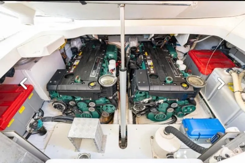  Yacht Photos Pics Engine room of 2011 Azimut Atlantis 40 yacht, featuring dual engines and storage compartments.