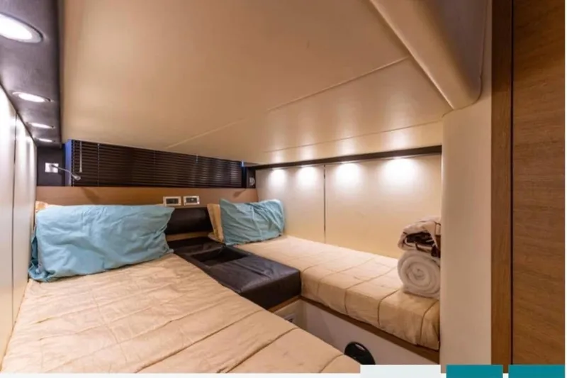  Yacht Photos Pics Luxurious cabin interior of 2011 Azimut Atlantis 40 yacht with cozy twin beds.