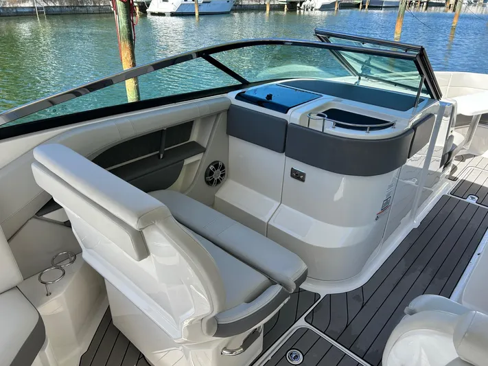  Yacht Photos Pics 2023 Sea Ray SLX 310 OB boat interior with sleek seating and modern design.