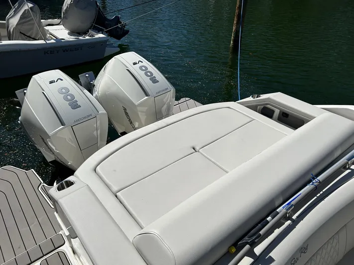  Yacht Photos Pics 2023 Sea Ray SLX 310 OB with twin outboard engines docked on water.