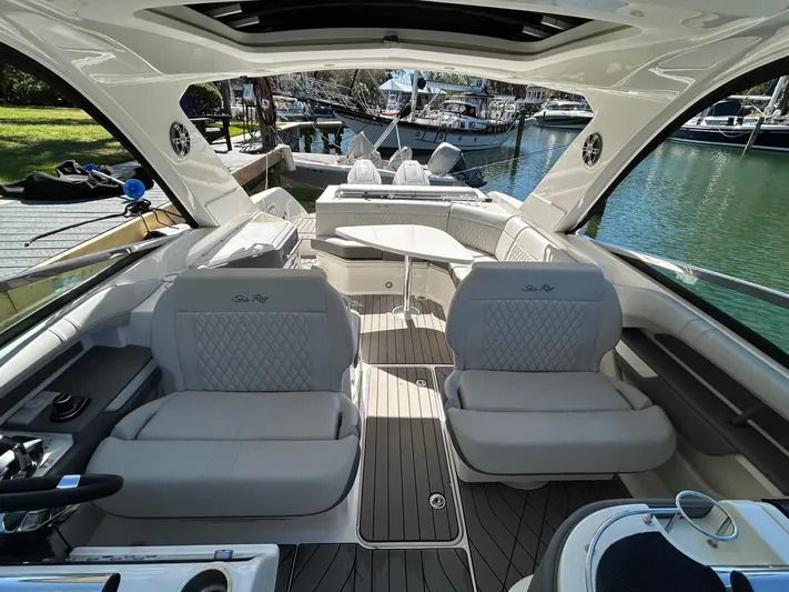  Yacht Photos Pics Luxurious 2023 Sea Ray SLX 310 OB boat interior with elegant seating and sleek design.
