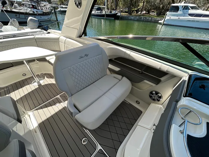  Yacht Photos Pics 2023 Sea Ray SLX 310 OB boat interior with luxurious seating and elegant design.