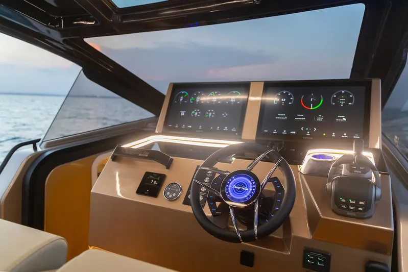  Yacht Photos Pics Luxurious Tesoro T50 Armani Casa yacht cockpit with advanced controls, 2025 model.