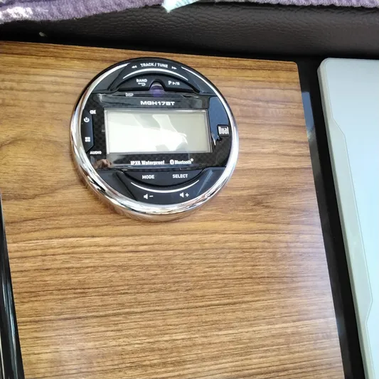  Yacht Photos Pics 2023 Ranger Tugs R-25 boat dashboard with Dual MGH17BT marine stereo.