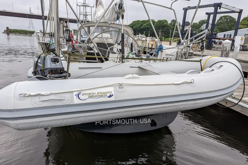 Ardent Yacht Photos Pics 1993 J Boats J/130 with inflatable dinghy, docked in Portsmouth, USA.