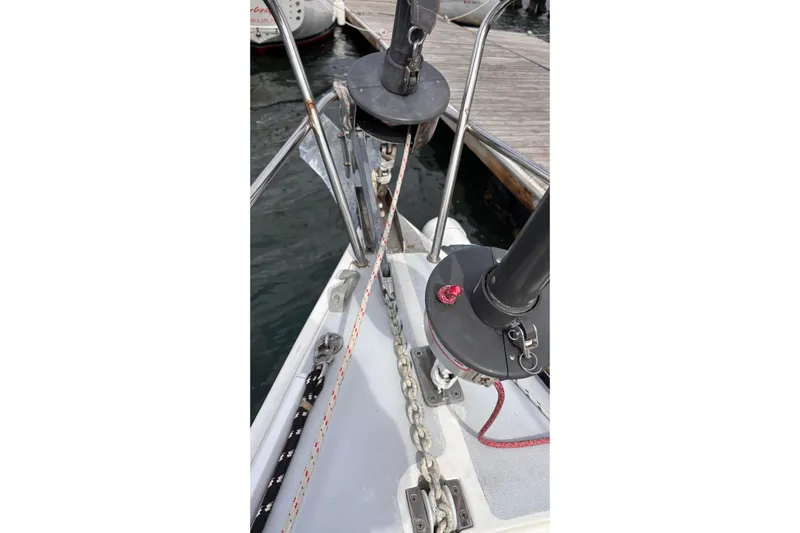 Ardent Yacht Photos Pics Bow of 1993 J Boats J/130 sailboat with anchor chain and dock view.