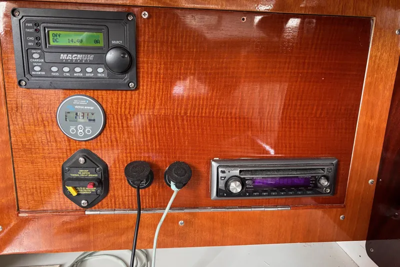 Ardent Yacht Photos Pics Control panel of a 1993 J Boats J/130 with electronic displays and audio system.