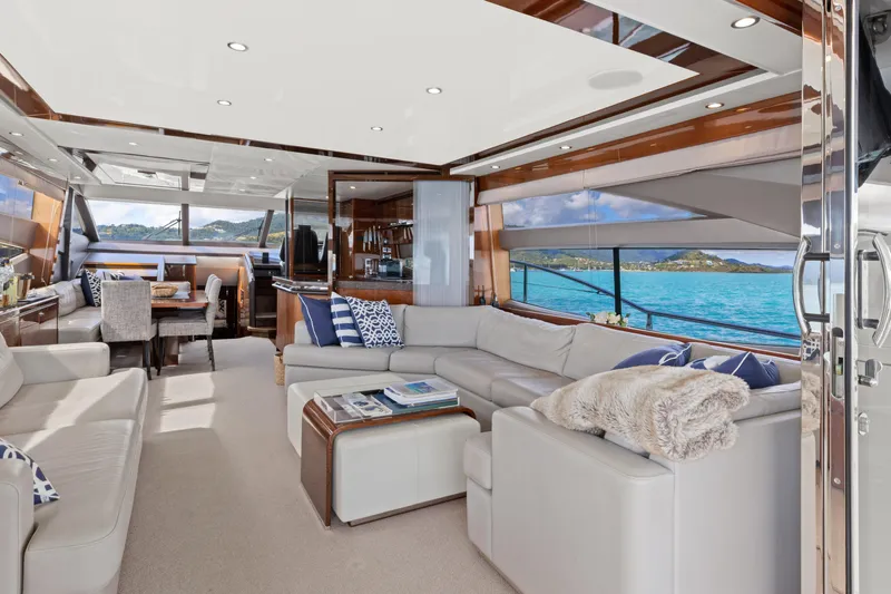 About Time Yacht Photos Pics Luxurious interior of 2014 Princess Flybridge 72 Motor Yacht with ocean view.
