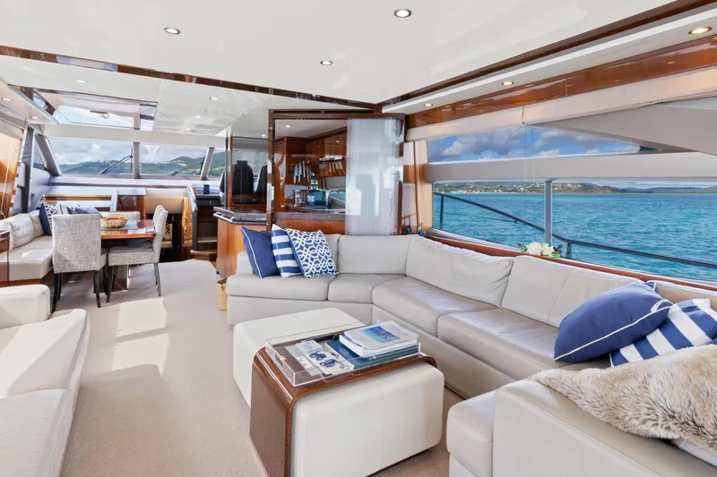 About Time Yacht Photos Pics Luxurious interior of 2014 Princess Flybridge 72 Motor Yacht with ocean view.