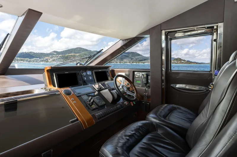 About Time Yacht Photos Pics Luxurious 2014 Princess Flybridge 72 Motor Yacht cockpit with scenic ocean view.