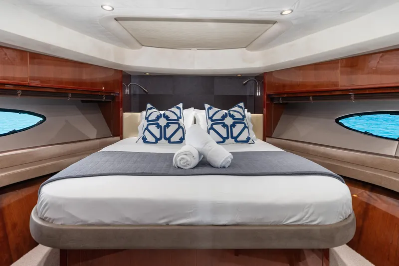 About Time Yacht Photos Pics Luxurious bedroom interior of 2014 Princess Flybridge 72 Motor Yacht with elegant bedding.