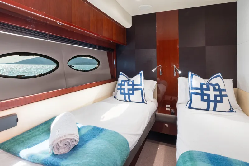 About Time Yacht Photos Pics Luxurious twin cabin on 2014 Princess Flybridge 72 Motor Yacht with ocean view.