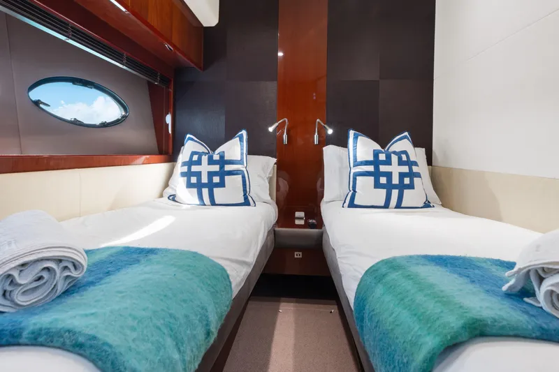 About Time Yacht Photos Pics Luxurious twin cabin in 2014 Princess Flybridge 72 Motor Yacht with elegant decor.