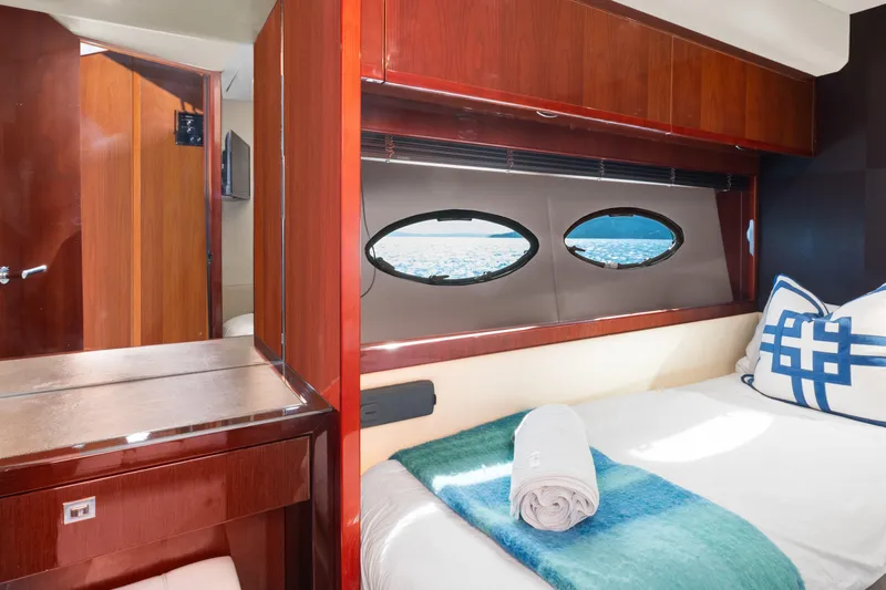 About Time Yacht Photos Pics Luxurious cabin interior of 2014 Princess Flybridge 72 Motor Yacht with ocean view.