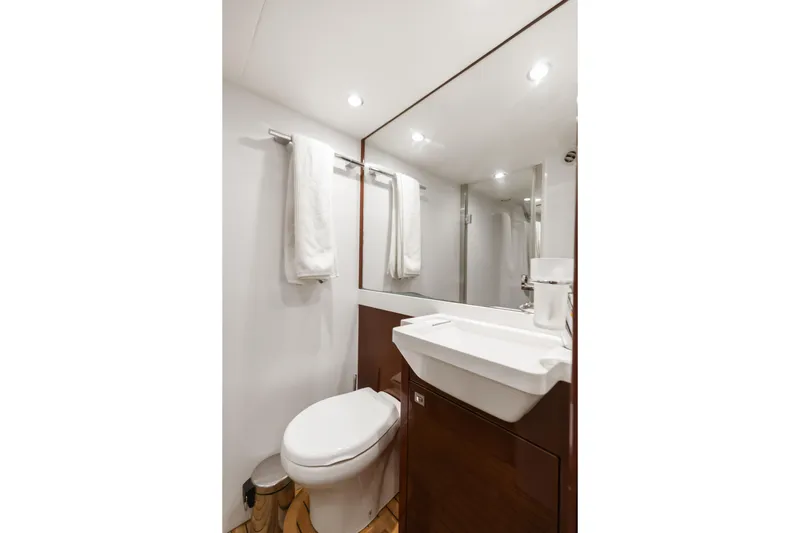 About Time Yacht Photos Pics Luxurious bathroom in 2014 Princess Flybridge 72 Motor Yacht, featuring modern fixtures and elegant design.