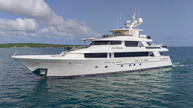 Far Niente Yacht Photos Pics Luxurious 2014 Westport 40M yacht cruising on calm blue waters.