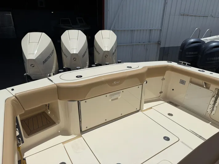  Yacht Photos Pics 2020 Scout 355 LXF boat with Mercury engines, beige interior, and spacious deck.