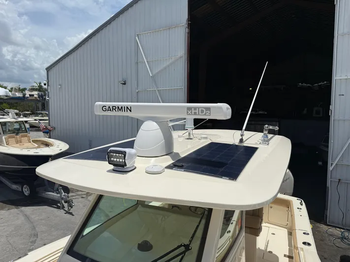  Yacht Photos Pics 2020 Scout 355 LXF boat with Garmin xHD2 radar and solar panel on the roof.
