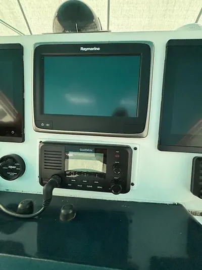  Yacht Photos Pics 1969 Hatteras 45 Sportfish dashboard with Raymarine and Garmin navigation equipment.