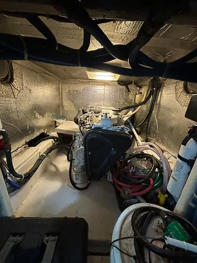  Yacht Photos Pics Engine room of 1969 Hatteras 45 Sportfish with visible wiring and equipment.