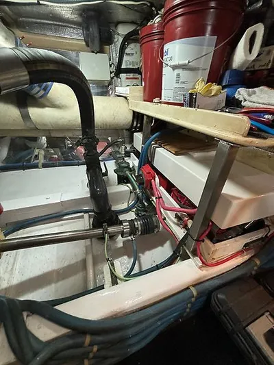  Yacht Photos Pics Engine room of 1969 Hatteras 45 Sportfish with visible components and storage.