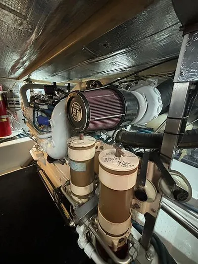  Yacht Photos Pics Engine room of 1969 Hatteras 45 Sportfish with visible filters and components.