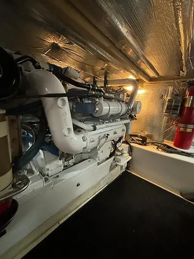  Yacht Photos Pics Engine room of 1969 Hatteras 45 Sportfish boat with visible machinery.