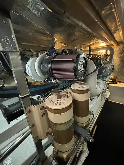  Yacht Photos Pics Engine room of 1969 Hatteras 45 Sportfish boat, showcasing detailed components.