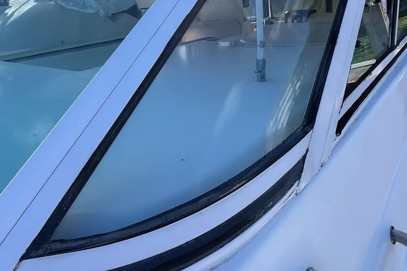 Two Can Do It Yacht Photos Pics Close-up of 2000 Cruisers Yachts 4450 windshield and deck area.