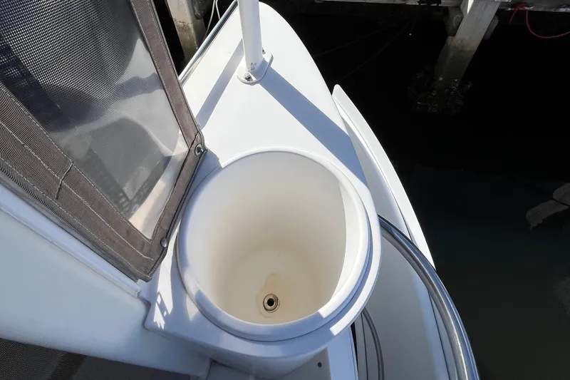 Two Can Do It Yacht Photos Pics Cruisers Yachts 4450, 2000 model, deck detail with circular compartment.