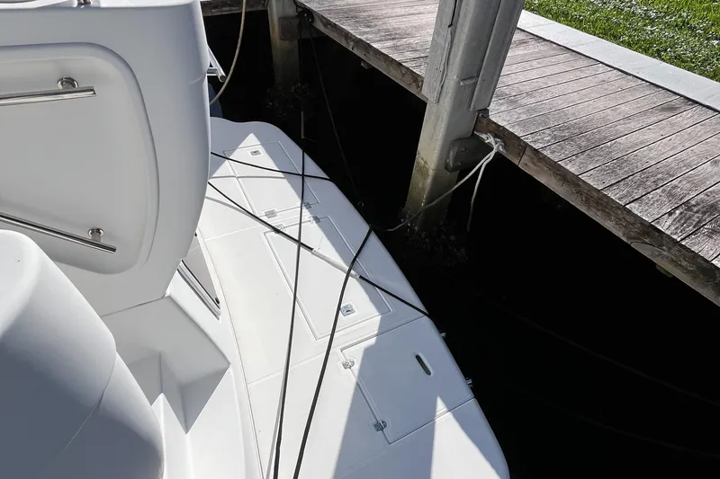 Two Can Do It Yacht Photos Pics Cruisers Yachts 4450 (2000) docked, showing deck and mooring lines.