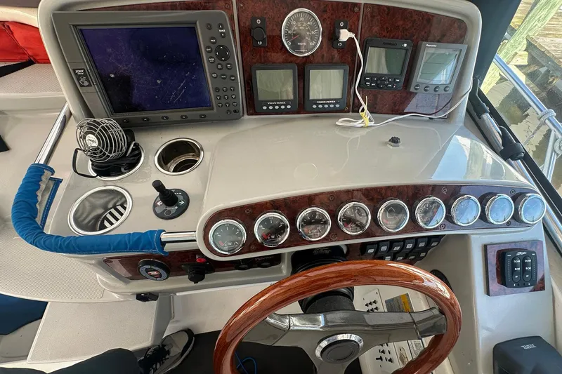 Sea Doc III Yacht Photos Pics 2005 Formula 37 PC boat dashboard with gauges, controls, and navigation equipment.