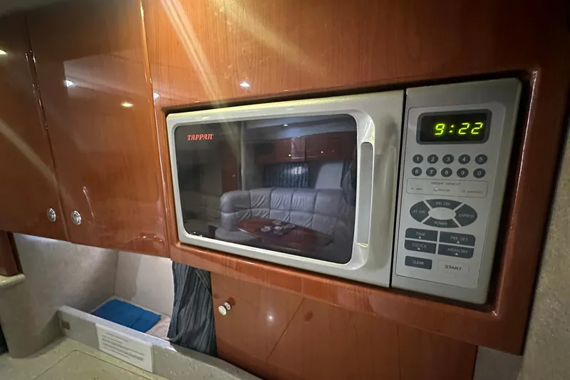 Sea Doc III Yacht Photos Pics Microwave in 2005 Formula 37 PC yacht interior, showing time 9:22.