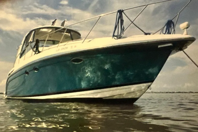 Sea Doc III Yacht Photos Pics 2005 Formula 37 PC boat on water under a cloudy sky.