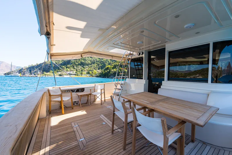 Jasmine 3 Yacht Photos Pics Luxurious 2011 Apreamare Maestro 65 yacht deck with scenic ocean view.