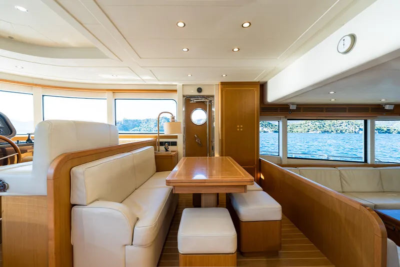 Jasmine 3 Yacht Photos Pics Luxurious interior of 2011 Apreamare Maestro 65 yacht with elegant seating and scenic windows.
