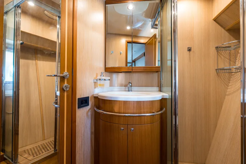 Jasmine 3 Yacht Photos Pics Luxurious bathroom interior of 2011 Apreamare Maestro 65 yacht with wooden finishes.