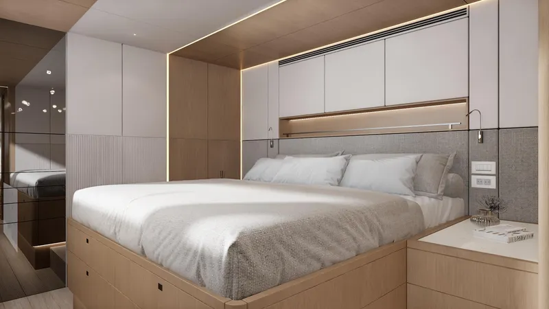  Yacht Photos Pics Luxurious bedroom interior of 2026 Bering BC 60 yacht with modern design and cozy bedding.
