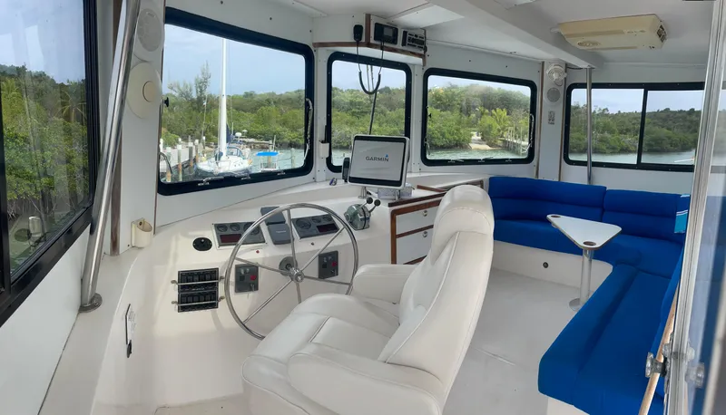 Sunset Cay Yacht Photos Pics 2004 Endeavour Explorer 46 PowerCat interior with helm, seating, and scenic windows.