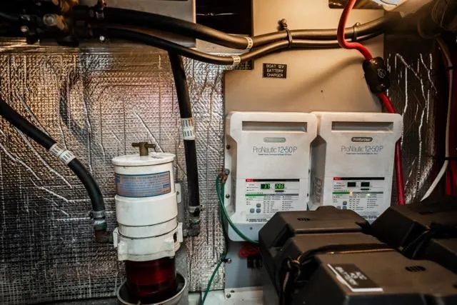 Lunasea Yacht Photos Pics Engine room of 2005 Cruiser Yachts 405 EXPRESS with electrical components and wiring.