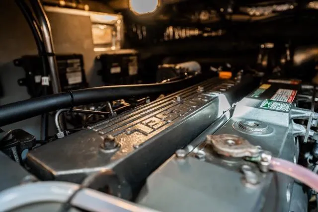 Lunasea Yacht Photos Pics Engine room of 2005 Cruiser Yachts 405 EXPRESS, showcasing detailed mechanical components.