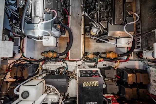 Lunasea Yacht Photos Pics Engine room of 2005 Cruiser Yachts 405 EXPRESS with visible machinery and components.