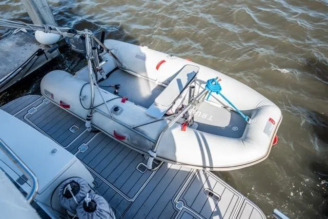 Lunasea Yacht Photos Pics Inflatable dinghy on 2005 Cruiser Yachts 405 EXPRESS, docked on a sunny day.