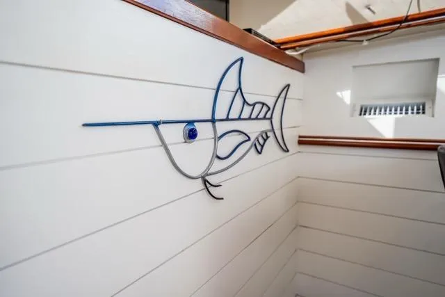 Lunasea Yacht Photos Pics Wall art of a fish on a 2005 Cruiser Yachts 405 EXPRESS boat interior.
