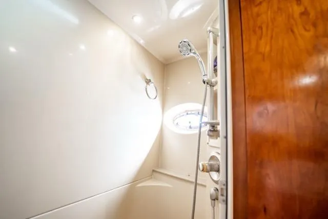 Lunasea Yacht Photos Pics Shower area in 2005 Cruiser Yachts 405 EXPRESS, featuring sleek design and modern fixtures.