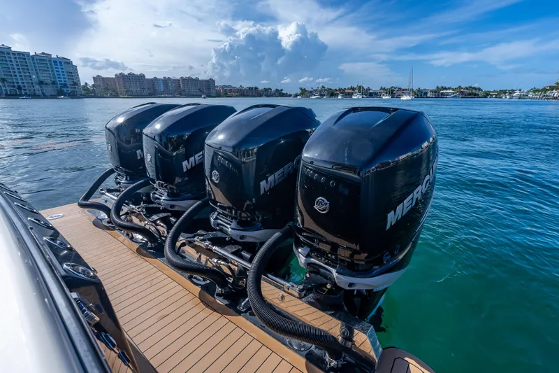  Yacht Photos Pics 2021 Scout 380 LXF boat with four Mercury outboard engines on water.