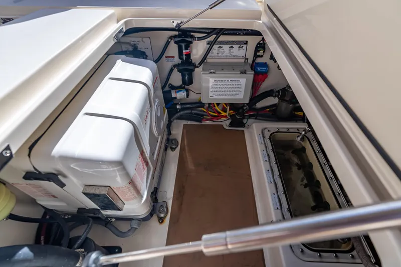  Yacht Photos Pics Engine compartment of 2021 Scout 380 LXF boat, showcasing mechanical components and wiring.